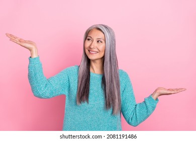 Photo Of Smiling Dreamy Female Choose Compare Product Alternative Offer Isolated On Pink Color Background