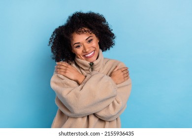Photo of smiling lady cuddle herself enjoy cozy textile garment not from killed animals isolated blue color background