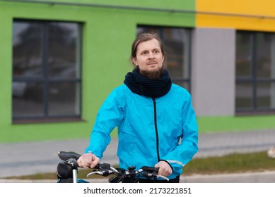 Photo Of A Smiling Young Man Running Errands On His Bicycle All Over The City