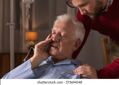 Photo of son caring about dying father
