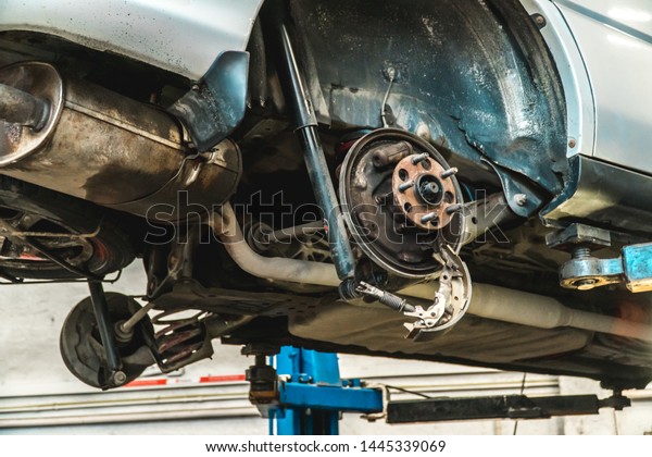 The photo of the sorted running gear of the car with\
a brake disk
