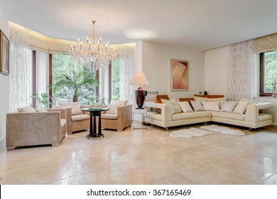 Photo of spacious living room designed in showy way - Shutterstock ID 367165469