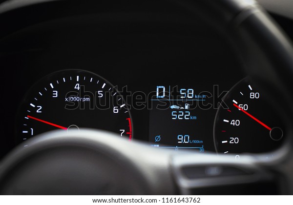 Photo speedometer in the car on the dashboard.\
Car dashboard.