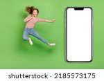 Photo of sportive energetic lady jump kick leg fight air side wear striped shirt isolated green color background