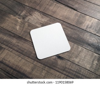 Photo Of Square Beer Coaster On Wooden Background. Blank Template For Your Design.