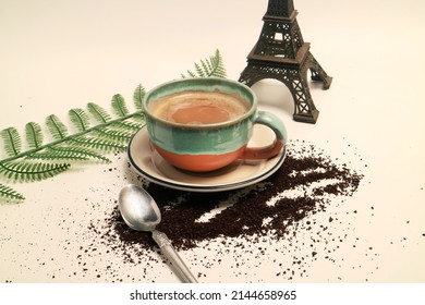 Photo Studio Concept Coffee Latte Cappuccino In A Cup With Eiffel Tower Miniature French Background