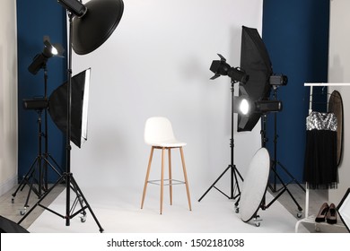Photo studio interior with set of professional equipment - Shutterstock ID 1502181038