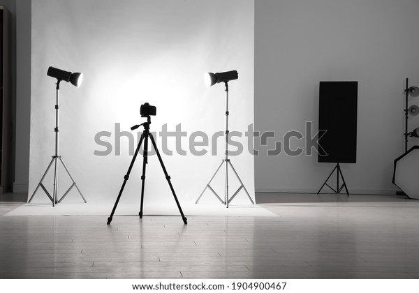 Photo\
studio interior with set of professional\
equipment