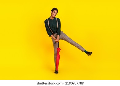 Photo of stylish trendy cool female guy move active parasol wear unisex fashion shirt isolated vibrant color background - Shutterstock ID 2190987789