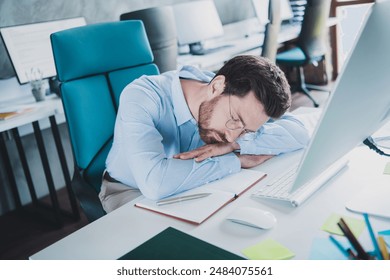 Photo of successful elegant man sleep desktop wear shirt loft interior modern office indoors - Powered by Shutterstock