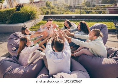 Photo Of Successful Freelancers Students Sitting Bean Bags Dealing Corporate Strategy Workplace Outdoors Outside City Urban Terrace