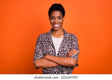 Photo of successful positive person crossed arms toothy smile look camera isolated on orange color background - Shutterstock ID 2221547397