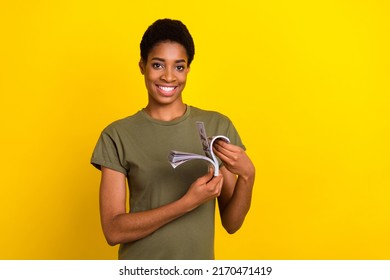 Photo Of Successful Wealthy Person Hold Count Dollar Banknotes Isolated On Yellow Color Background