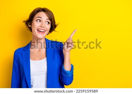 Photo of surprised business lady promoter indicate shopping company sale isolated vivid color background