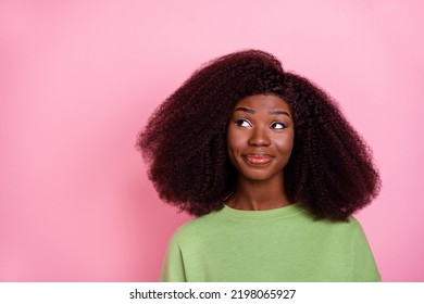 Photo Of Sweet Big Hairdo Brunette Lady Look Up Wear Green Pullover Isolated On Pink Color Background