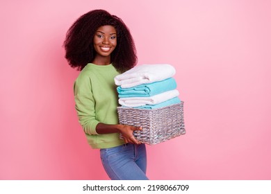 Photo Of Sweet Cute Girl Dressed Green Pullover Holding Fresh Linen Basket Isolated Pink Color Background