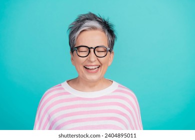 Photo of sweet funny lady wear striped sweater spectacles laughing empty space isolated turquoise color background - Powered by Shutterstock