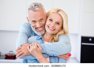 Photo of sweet pretty mature lovers dressed jeans shirt cuddling smiling indoors room home - Powered by Shutterstock