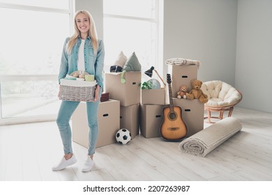 Photo Of Sweet Pretty Young Lady Dressed Denim Shirt Moving New Flat Boxes Stack Holding Basket Indoors Apartment