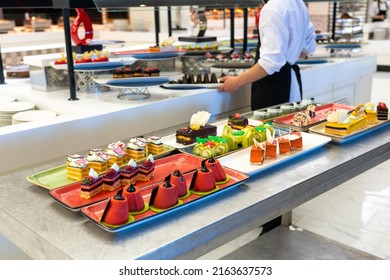 Photo Of A Sweet Table For The Holiday Pastries And Cakes In The Hotel Bar With Staff