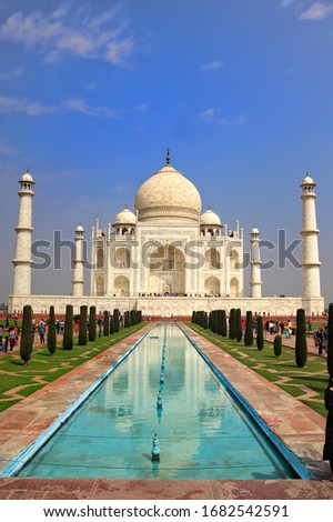 photo of Taj mahal in front of the fountain