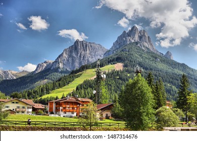 Photo taken in the alpine mountains of Italy.  On a sunny summer day, in one of the many alpine villages.  Summer 2019
