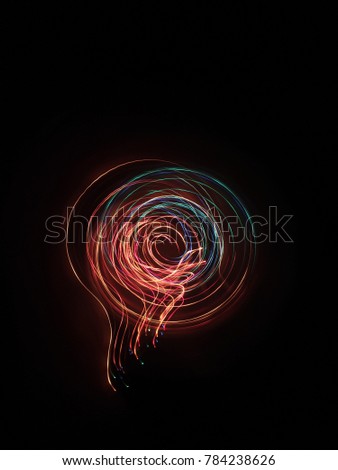 A photo taken by the camera in free flight, Bright colored lines and figures on black. Flyfly. Camera toss image Like electric lamp