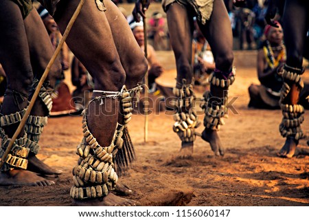 The photo was taken during the Kuru Dance Festival in Botswana, Africa, I group of men performing their traditional dance. 