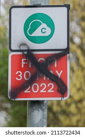 Photo taken on 25 January 2022 in Edenfield, Greater Manchester. Brand new road sign showing the controversial Clean Air Zone which will operate from 30 May 2022. Sign defaced by protestors.