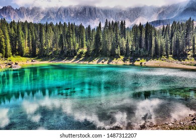 Photo taken on Lake Carezza in Italy on a sunny summer day. When shooting, an ND filter was used to achieve color depth.