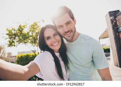 Photo of tender couple in love make selfie look camera embrace wear casual clothes in garden park outdoors - Powered by Shutterstock