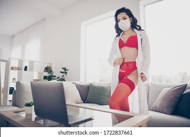 Photo Of Tender Hot Lady Work Home Online Chat Service Talk Client Undressing His Wish Play Seduce Nurse Role Take Off Lab Coat Look Notebook Screen Wear Red Bikini Flu Mask Room Indoors