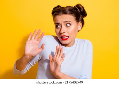 Photo of terrified young female try to avoid annoying person asking to stop isolated on yellow color background - Shutterstock ID 2175402749
