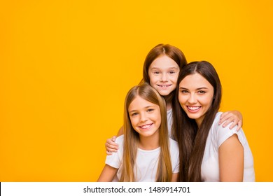 Photo of three amazing ladies of different age hugging wear casual clothes isolated yellow background - Shutterstock ID 1489914701