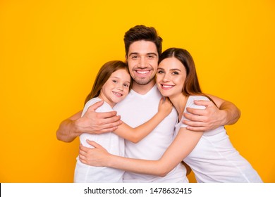 Photo Of Three Family Members Hugging  Happy Together Wear Casual Outfit Isolated Yellow Background