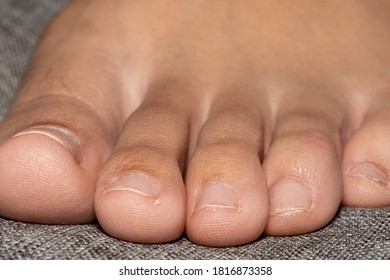 Photo Of Tip Toe In A Textured Surface