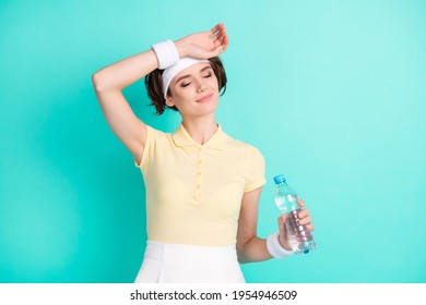 Photo Tired Calm Young Woman Hold Hand Forehead Sweat Water Bottle Isolated On Teal Color Background