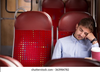 Photo Of Tired Commuter Going Home After Work