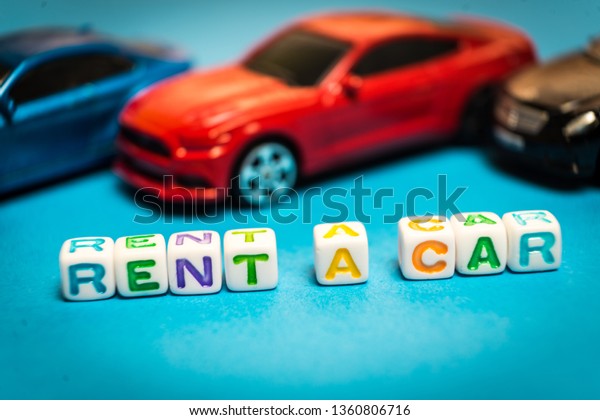 Photo toy cars.\
The inscription to rent a\
car.