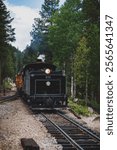 A photo of a train coming on the georgetown loop in Colorado