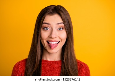 Woman sticking tongue out