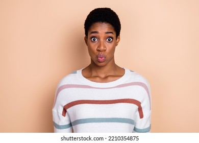 Photo Of Tricky Shocked Young Unisex Person Wear Sweater Big Eyes Lips Pouted Isolated Beige Color Background