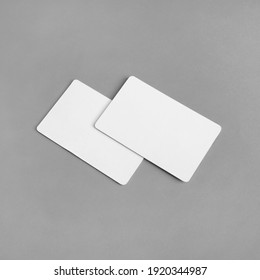 Photo Of Two Blank White Business Cards On Gray Paper Background. Branding ID Template.