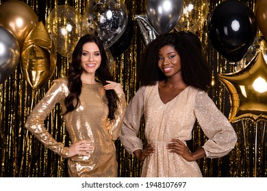 Photo Of Two Charming Pretty Ladies Posing Hands Hips Balloon Party Wear Glossy Dresses Isolated Tinsel Background