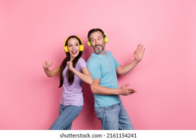 Photo of two excited crazy people enjoy listen favorite song dancing isolated on pink color background - Shutterstock ID 2161154241