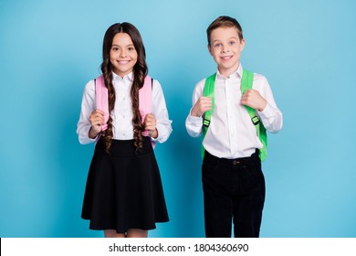 Photo Of Two Little Girl Boy Schoolkid Best Friends Sister Brother Prepare Morning Walk To School Wear Backpack White Shirt Black Pants Dress Isolated Blue Color Background