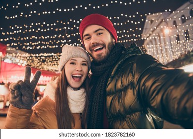 Photo Of Two People Best Friends Take Selfie Make V-sign Under Outside X-mas Christmas Tradition Illumination