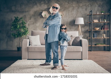 Photo Of Two People Funky Grandpa Small Nice Granddaughter Cool Stylish Trendy Sun Specs Denim Clothes Confident Best Friends Carnival House Party Stay Home Quarantine Living Room Indoors