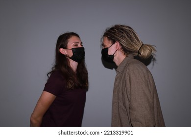 Photo Of Two People Kissing In Medical Masks