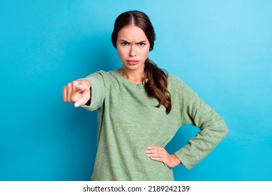 Photo Of Unsatisfied Furious Girl Pointing Finger Camera You Blame Accuse Isolated On Blue Color Background